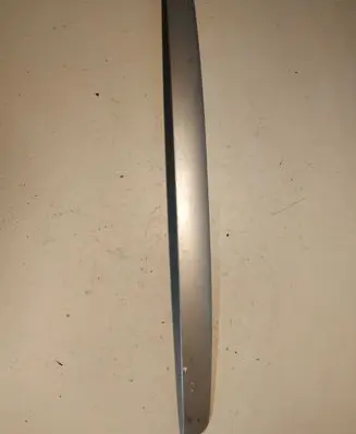 Trunk door license plate light bar
