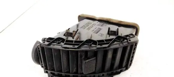 Nissan Note (E11) Dash center air vent grill 687519U00B P19660A27710