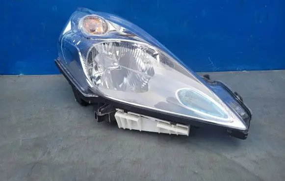 Nissan Leaf I (ZE0) Headlight/headlamp 260103NLX