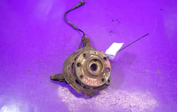 Opel Tigra B Front wheel hub spindle knuckle 13154318