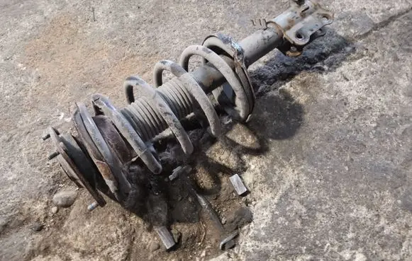 KIA Carnival Front shock absorber with coil spring
