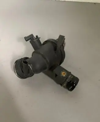 Thermostat/thermostat housing