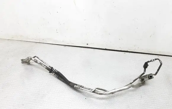 Opel Corsa D Air conditioning (A/C) pipe/hose 13203336