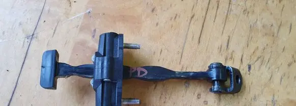 Ford Focus Front door check strap stopper