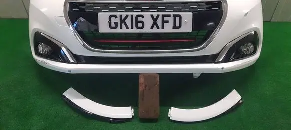 Peugeot 208 I Front bumper 