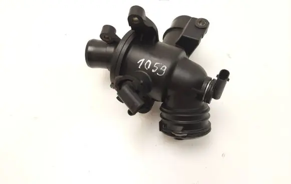 Thermostat/thermostat housing