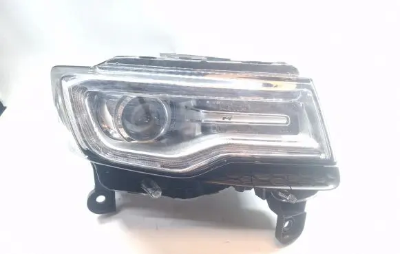 Jeep Grand Cherokee Headlight/headlamp 68144704AD M167519