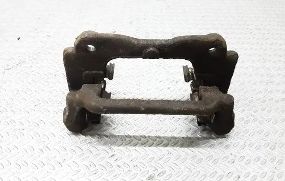 Toyota Avensis T250 Brake caliper pad carrier rear 