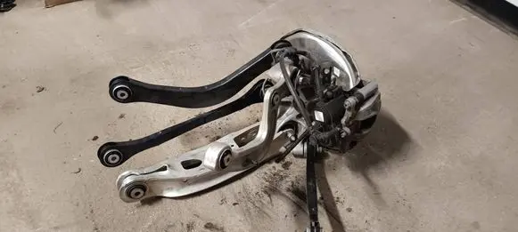 Rear wheel hub spindle/knuckle