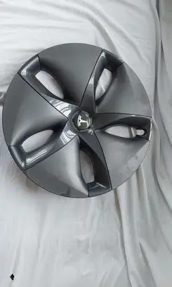 Tesla Model 3 R17 wheel hub/cap/trim 104423199B 1044231