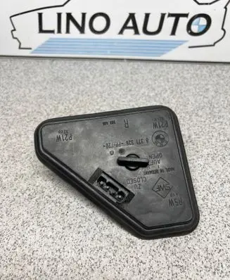 Tail light bulb cover holder