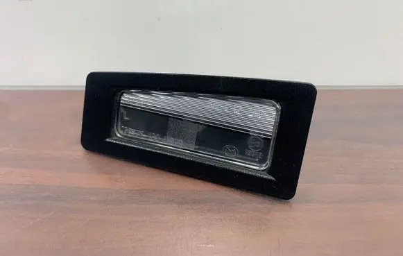 Mazda CX-3 Number plate light 13041979