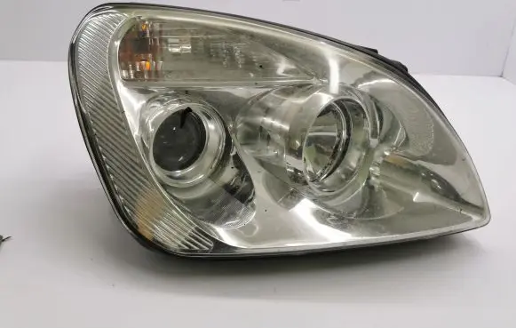 KIA Carens II Headlight/headlamp E132138 E130142