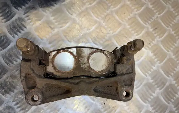 Subaru Legacy Front Brake Caliper Pad/Carrier 