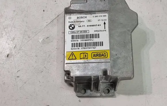 BMW 1 E81 E87 Airbag control unit/module 9166057 0285010066 31916605701J
