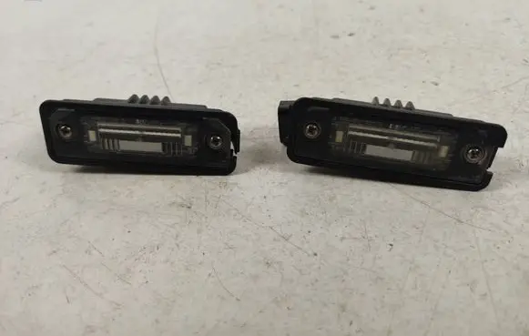 Volkswagen Eos Number plate light 1J6943021B