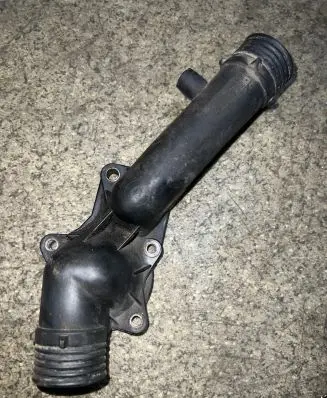 Thermostat/thermostat housing
