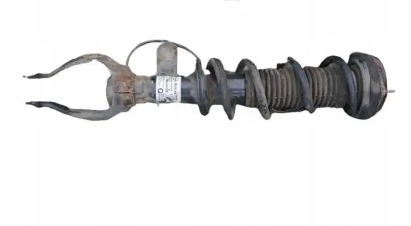 Infiniti Q60 Front shock absorber with coil spring 561115CH0A