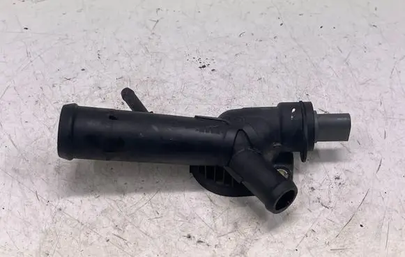 Volkswagen Golf VI Thermostat housing 03L121131F
