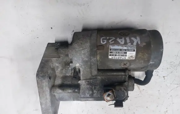 KIA Carnival Starter motor 0K53218400A 031114140