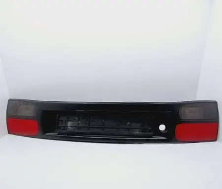 Renault Laguna I Trunk door license plate light bar 7700820049 22260002