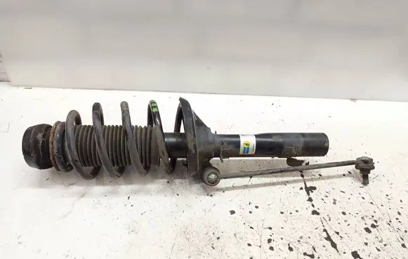 Front shock absorber with coil spring
