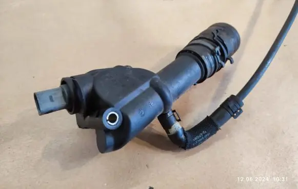 Thermostat/thermostat housing
