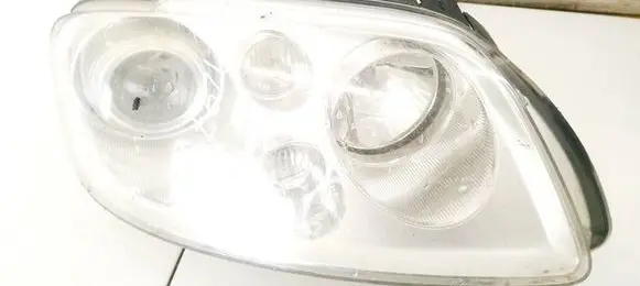 Volkswagen Touran I Headlight/headlamp 0301205272