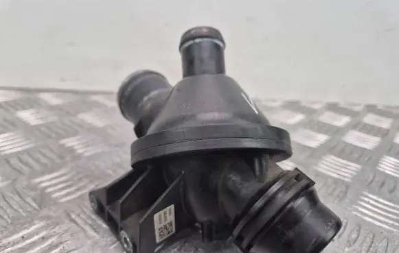 Thermostat/thermostat housing