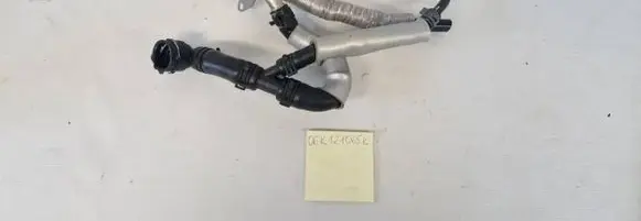 Volkswagen Golf VII Engine coolant pipe/hose 06K121065K