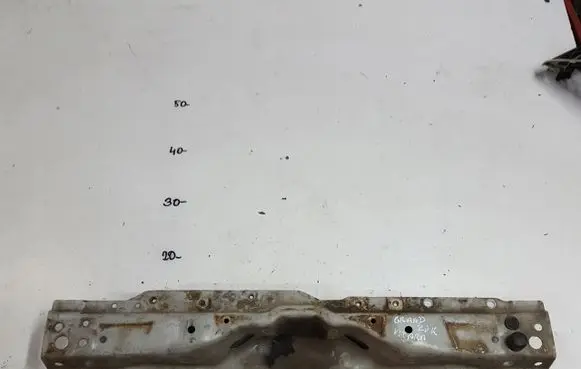 Top upper radiator support slam panel