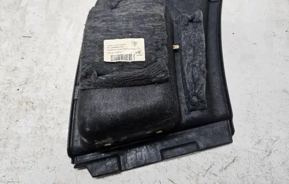 Trunk/boot lower side trim panel
