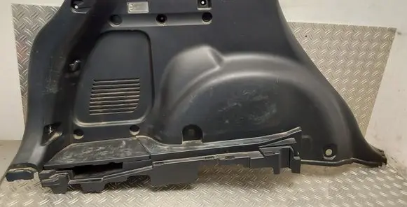 Trunk/boot lower side trim panel