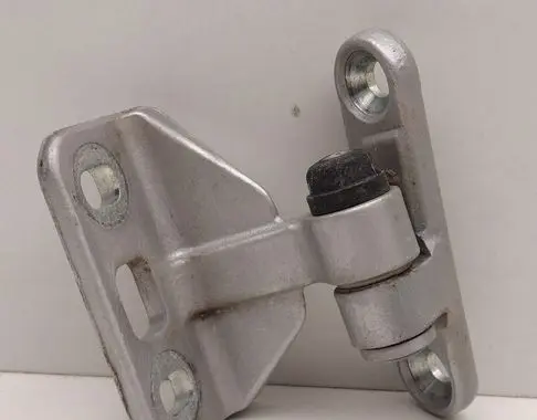 Rear door upper hinge