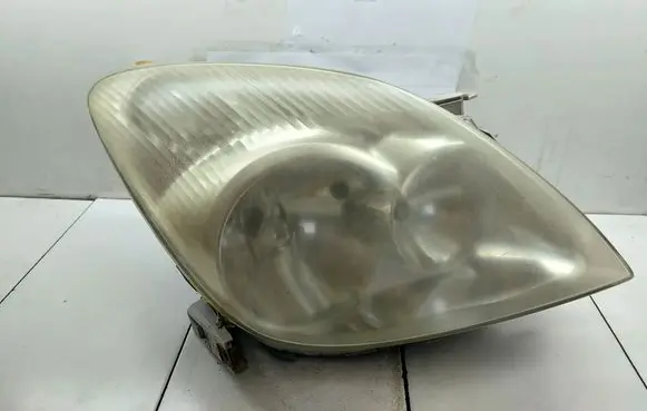 Toyota Corolla Verso E121 Headlight/headlamp 9922679004