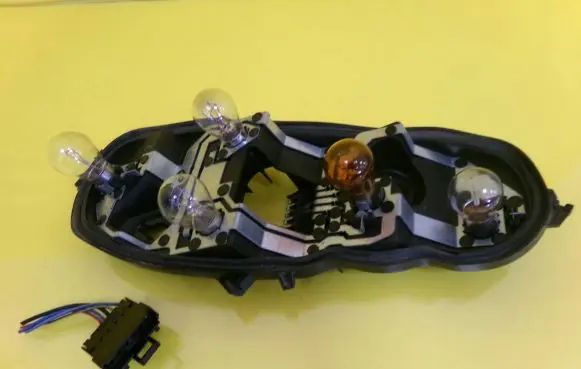 Opel Corsa D Tail light bulb cover holder 89037852