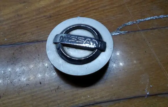 Nissan Primera Original wheel cap 403428H700