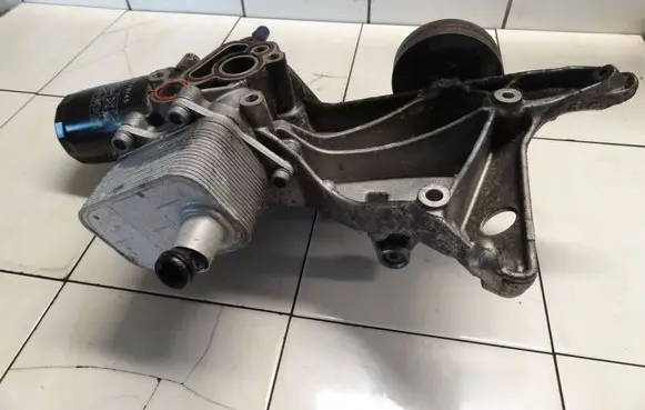 Audi A5 8T 8F Oil filter mounting bracket 06H903143H