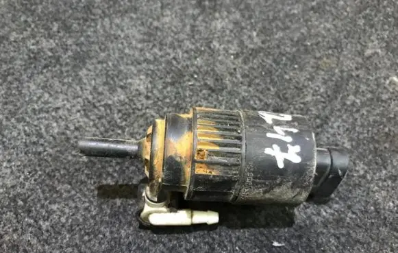 Renault Laguna I Windscreen/windshield washer pump 7700821782
