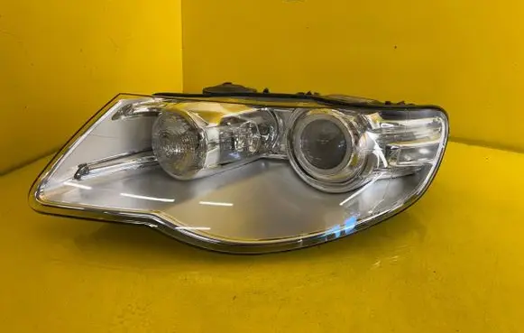 Volkswagen Touareg I Headlight/headlamp 7L6941031C