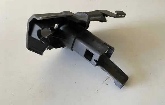 Volkswagen Touran III Headlight washer nozzle holder 