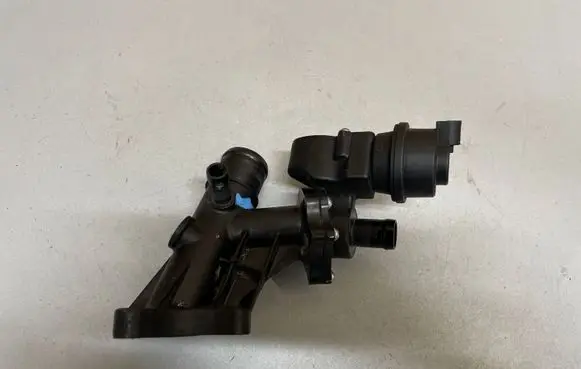 Thermostat/thermostat housing