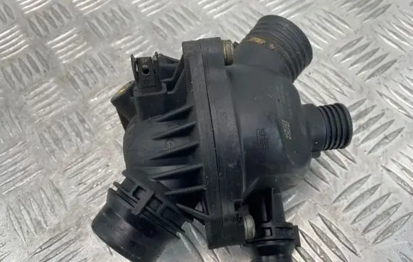 Thermostat/thermostat housing