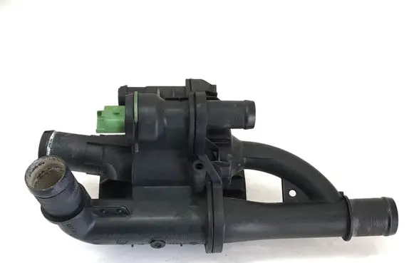 Thermostat/thermostat housing