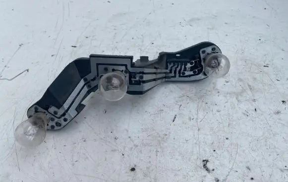 Toyota Avensis T250 Tail light bulb cover holder