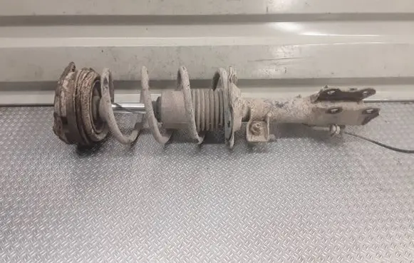 Nissan Tiida C11 Front shock absorber with coil spring 
