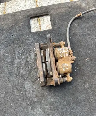 Subaru Outback (BT) Front brake caliper 