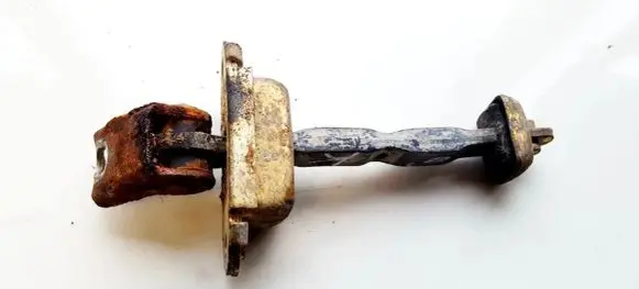 Nissan Primera Rear door check strap stopper