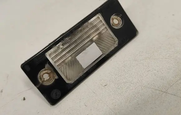 Volkswagen Touareg I Number plate light 1J5943021A