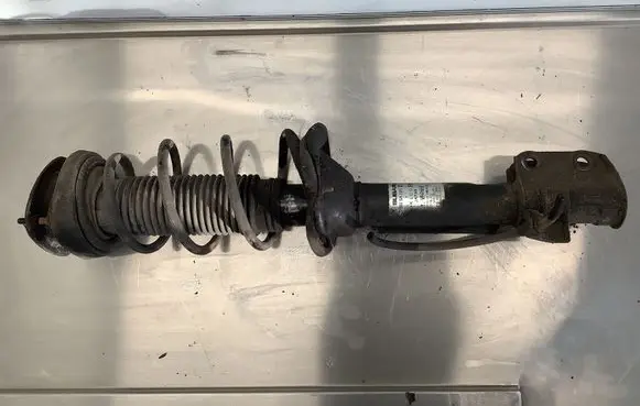 Subaru Forester SG Front shock absorber with coil spring 20360SA020EY